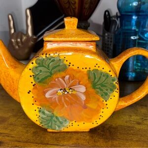 orange Art glazed signed handle spout top
Musty Orange green decorative art